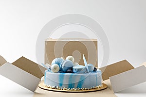 blue tasty cake in opened box