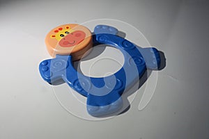 a blue teether with cow caracter for your babies photo