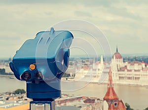 Blue telescope at Budapest, Hungary. Retro toned photo.