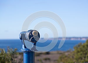 Blue telescope on coast of Malibu