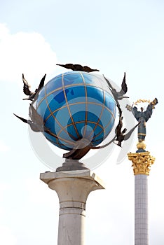 Blue terrestrial globe sculpture, Kiev photo