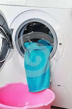 Blue terry towel in washing machine