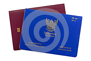 Blue Thai Work Permit book on electronic passport isolated on white background.