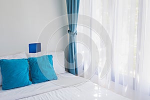 Blue theme pillows white bedroom light curtain