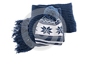 Blue thick warm winter knitted ski hat and scarf isolated on white background