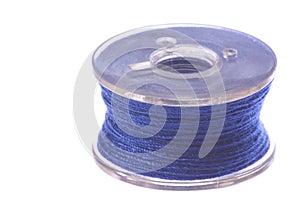 Blue Thread Bobbin Macro Isolated