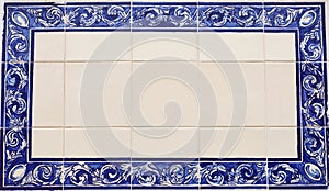 blue tile plaque in wall photo