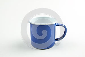 Blue tin cup isolate on white background.