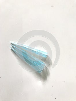 Blue tips on white table background