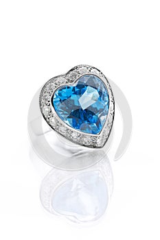 Blue topaz surrounded with diamond ring