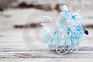 Blue Toy Baby Carriage Prepared as a Gift for Baby Shower