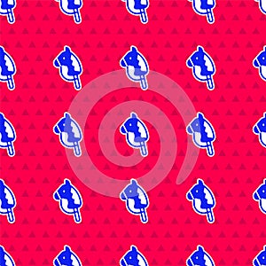 Blue Toy horse icon isolated seamless pattern on red background. Vector