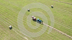 Blue Tractor Hay Bales Aerial View