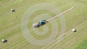 Blue Tractor Hay Bales Aerial View