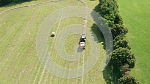 Blue Tractor Hay Bales Trees Aerial View