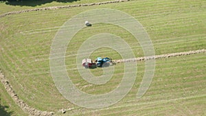 Blue Tractor Hay Bales Trees Aerial View