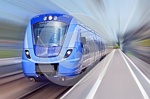 Blue train in motion