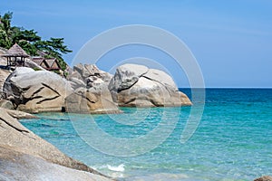 Blue tranquil sea and boulders beach at Koh Phangan, Thailand, Asia