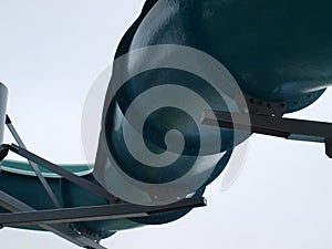 Blue Tubes Seen From Underneath Slide of Waterpark