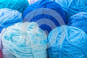 Blue and turquoise wool skeins of thread