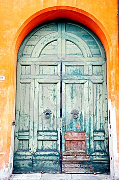 Blue tuscan door in Italy photo