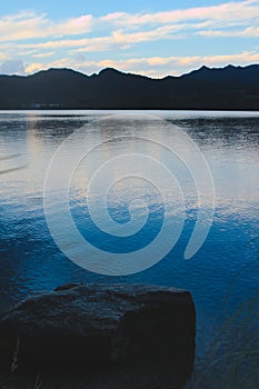 Blue twilight sky reflected on the waters of lake Potrero de los Funes, in San Luis, Argentina.