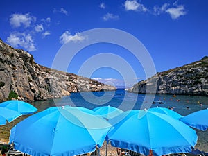 The Blue Umbrellas of Mgarr ix-Xini Gozo