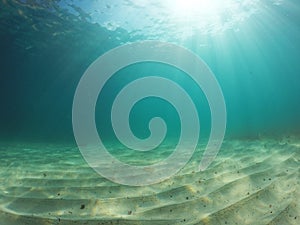 Blue underwater sand in the mediterranean