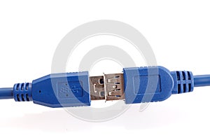Blue USB 3.0 power and data extension cable connectors isolated on white background. Closeup