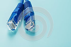 Blue UTP Internet Cable Isolated on a blue background Ethernet Cord