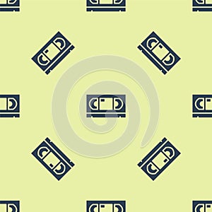 Blue VHS video cassette tape icon isolated seamless pattern on yellow background. Vector