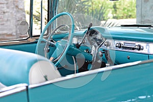 A blue vintage car parked in Phoenix, Arizona