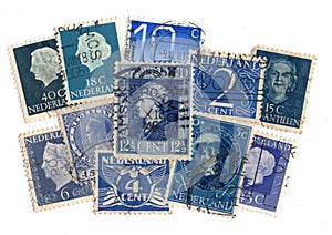 Blue vintage postage stamps from the Netherlands.