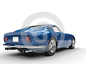 Blue vintage sports car - taillight view