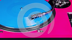 Blue vinyl and pink dj turntable stop motion