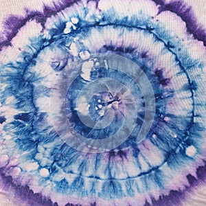 Blue and violet concentric circles on silk batik