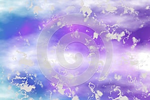 Blue violet purple dreamy heaven background with white fluffy clouds.Sky