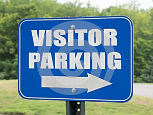 Blue visitor parking sign