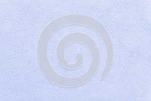 Blue wall as a background. Light blue plaster texture background