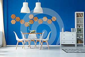 Blue walls and simple furniture