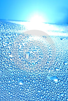 Blue water bubbles in sunrise