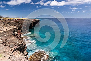 Blue water near sout point on Big island photo