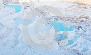 Blue water in the Pamukkale travertine pools