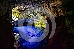 The blue water of Poco Encantado or Enchanted Well, in a cave at Itaete, Chapada Diamantina, Bahia, Brazil
