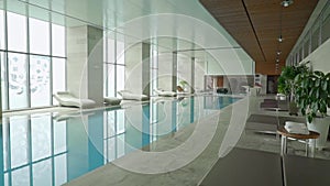 Blue water pool in a large room