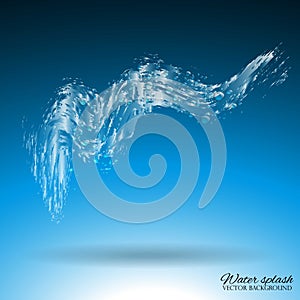 Blue water splash. Spray with drops . Aqua splashing on a blue background.
