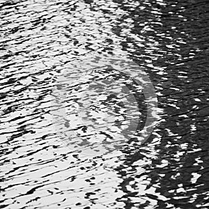 Blue water surface background texture blurred light with wave ri