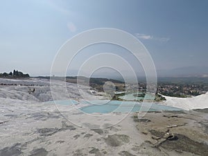 Blue water travertine pools and terraces in Pamukkale, Turkey