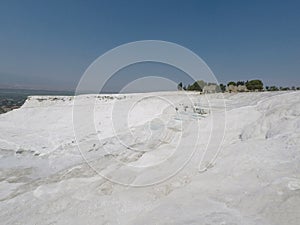 Blue water travertine pools and terraces in Pamukkale, Turkey