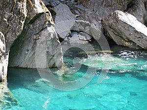 Blue water in underground cave